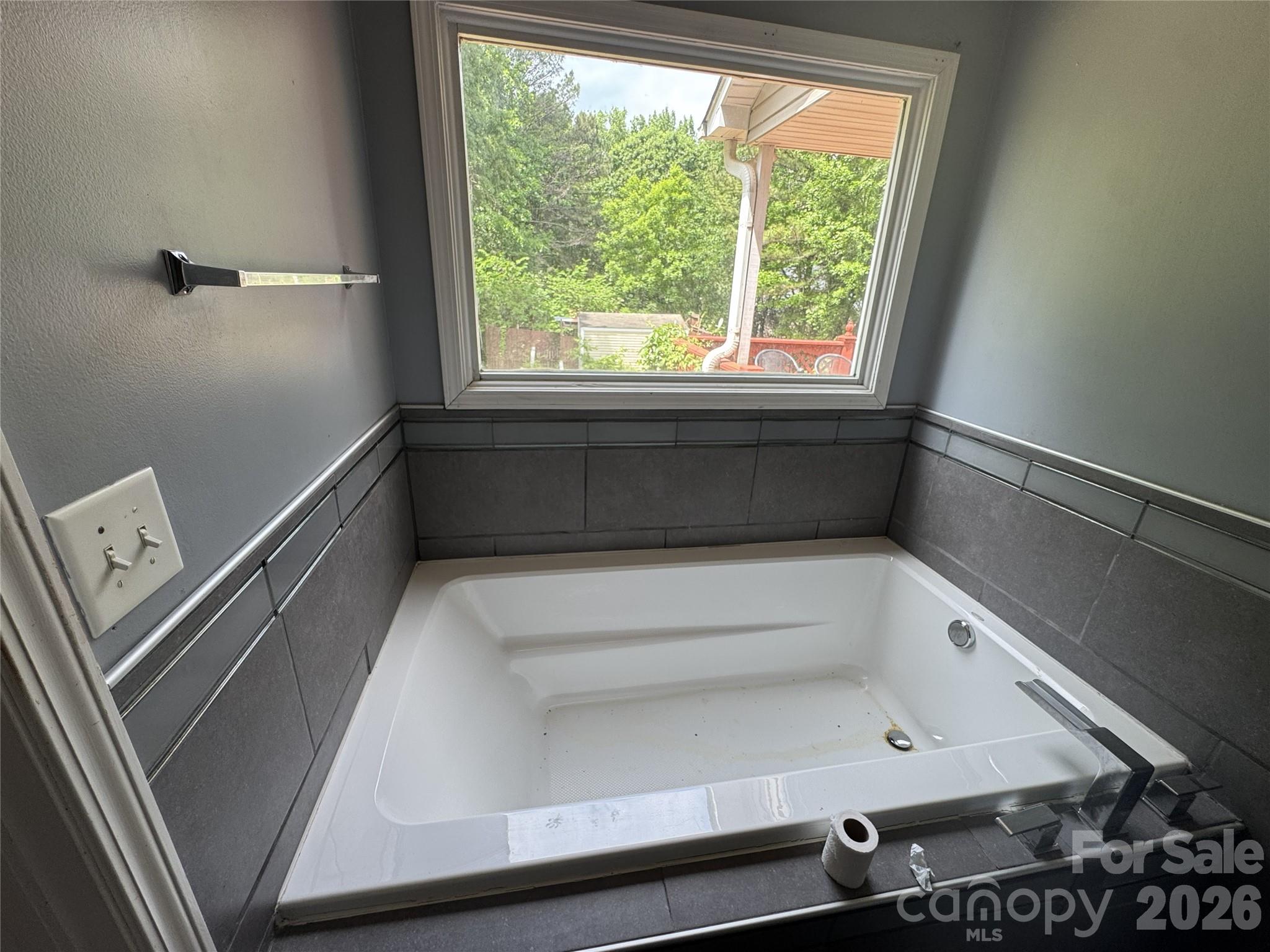 8441 Shelley Mullis Road Fort Mill, SC 29707 - Photo 10 of 23 a bathroom with a bathtub