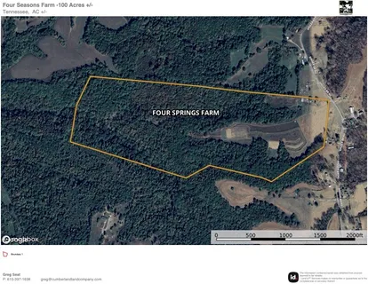 a black and white photo of a field