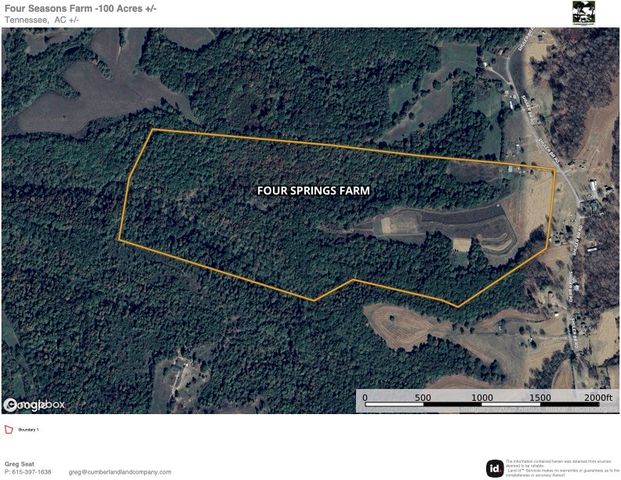 a black and white photo of a field