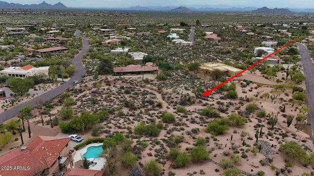 an aerial view of a city with lots of residential buildings