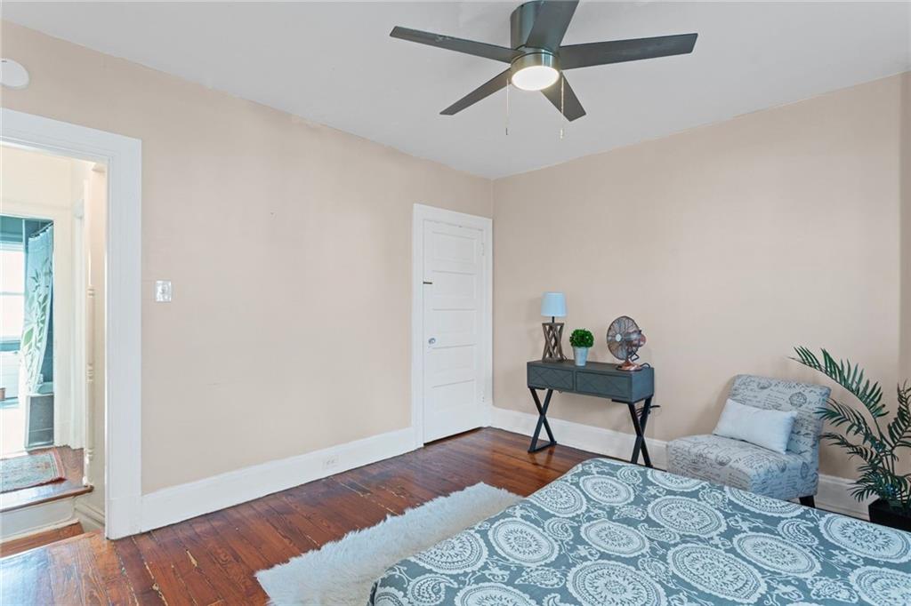 420 Fisk Street Pittsburgh, PA 15224 - Photo 17 of 30 a living room with furniture and a wooden floor