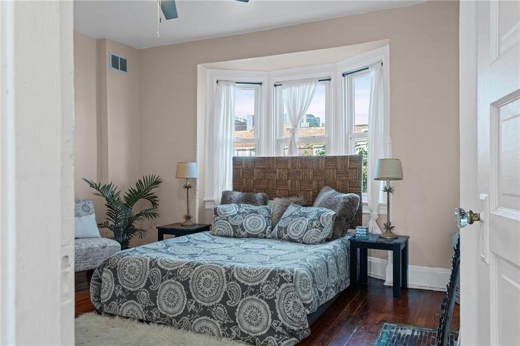 420 Fisk Street Pittsburgh, PA 15224 - Photo 21 of 30 a bedroom with a bed and window