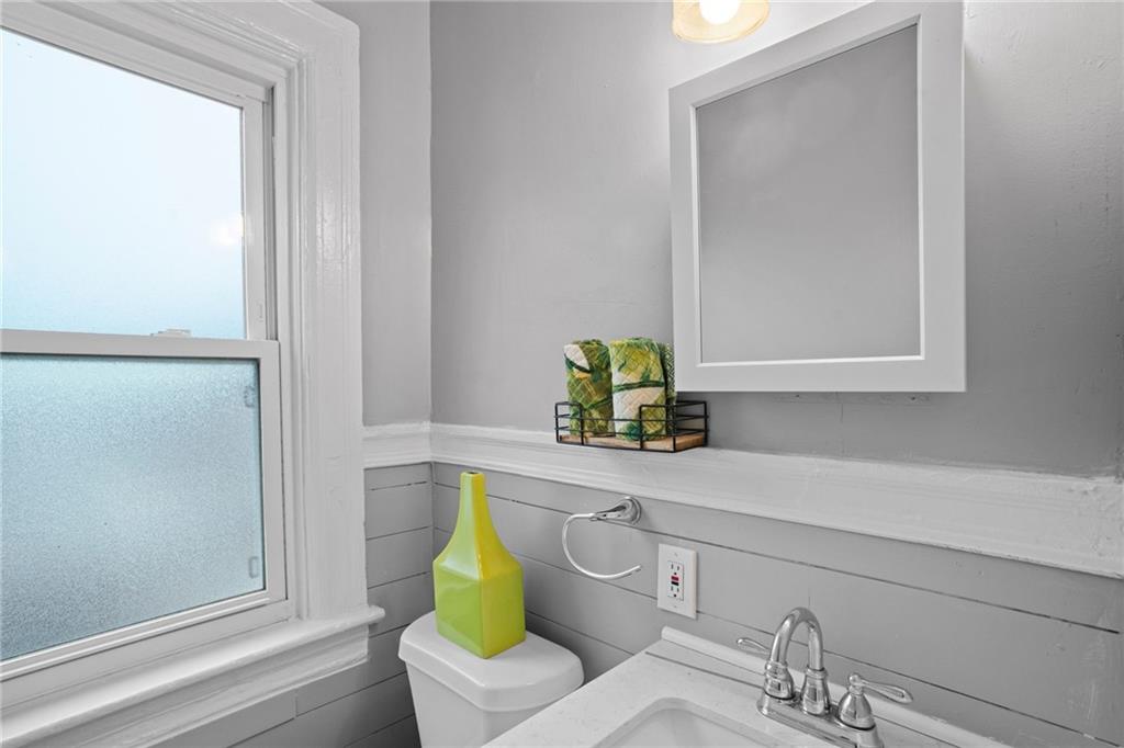 420 Fisk Street Pittsburgh, PA 15224 - Photo 23 of 30 a bathroom with a sink and a mirror