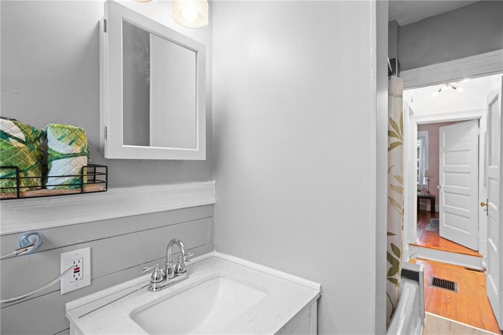 420 Fisk Street Pittsburgh, PA 15224 - Photo 25 of 30 a bathroom with a sink and a mirror