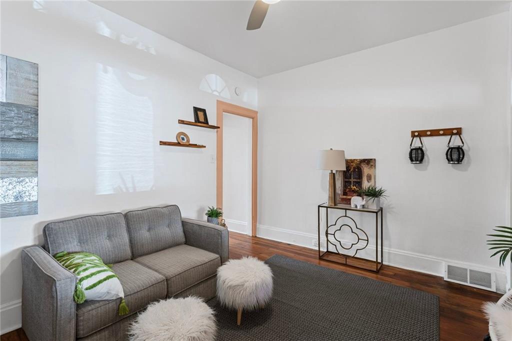 420 Fisk Street Pittsburgh, PA 15224 - Photo 9 of 30 a living room with furniture and a window