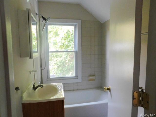 10 South Walnut Street Beacon, NY 12508 - Photo 18 of 18 a bathroom with a tub and a sink