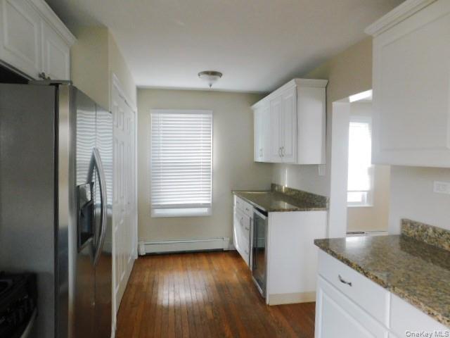 10 South Walnut Street Beacon, NY 12508 - Photo 6 of 18 a kitchen with granite countertop a refrigerator and a sink