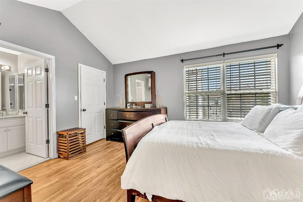 2510 Ridgeview Court Sayreville, NJ 08859 - Photo 15 of 28 a bedroom with a bed and a dresser