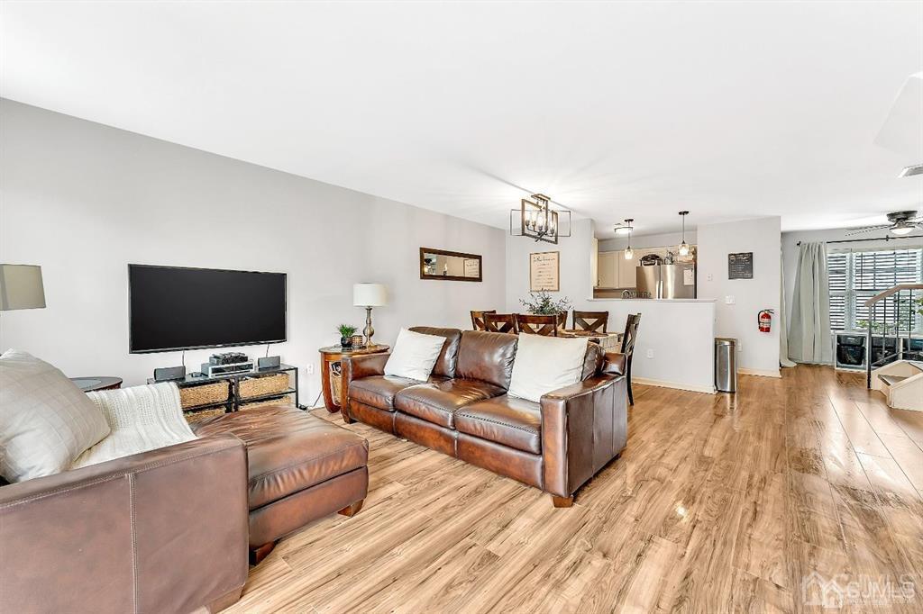 2510 Ridgeview Court Sayreville, NJ 08859 - Photo 5 of 28 a living room with furniture and a flat screen tv