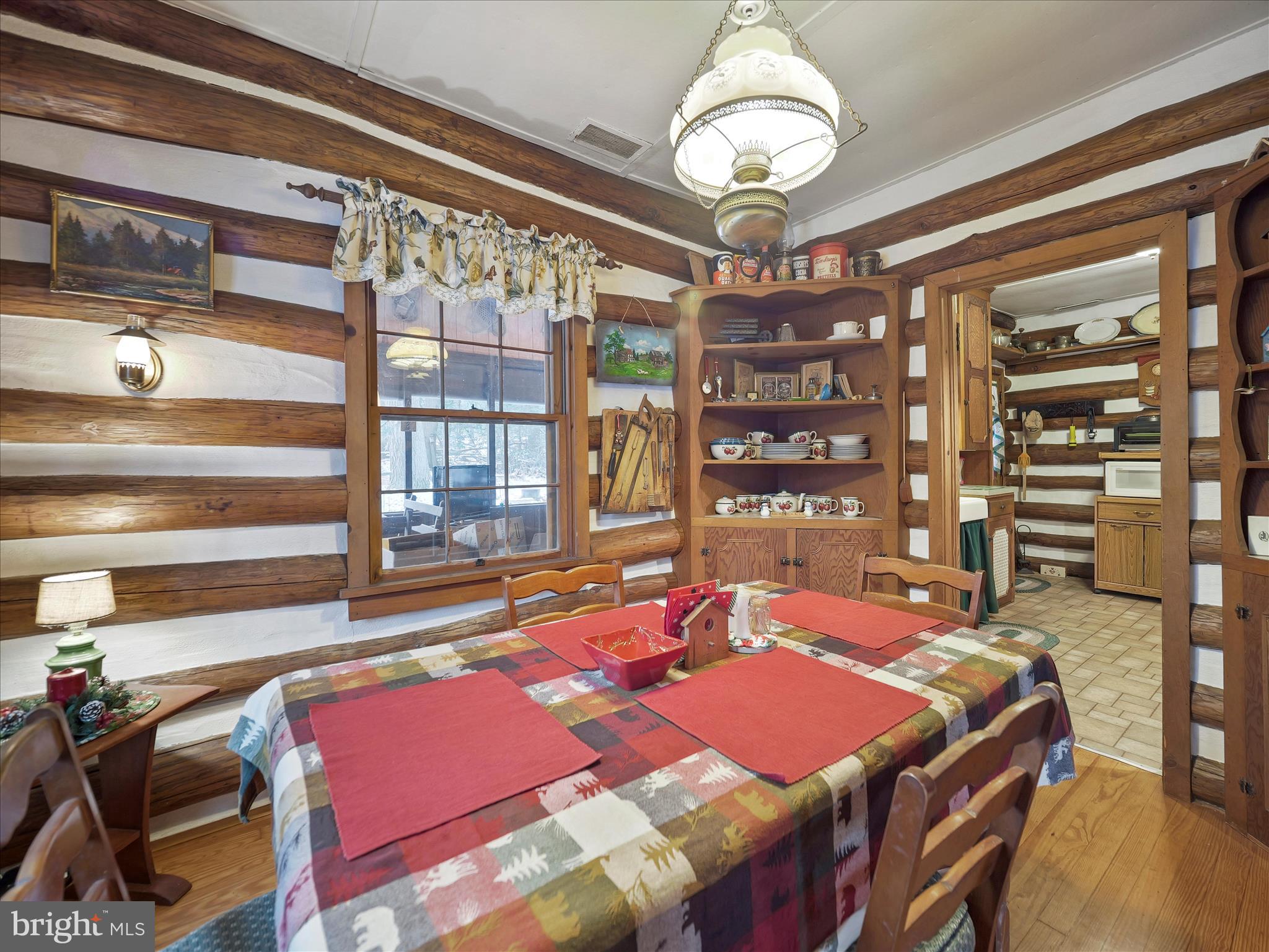 10086 Golf Course Road Fayetteville, PA 17222 - Photo 16 of 33 a table and chairs in a room