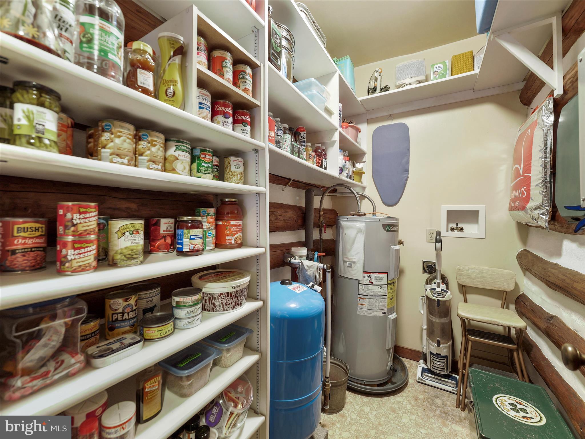 10086 Golf Course Road Fayetteville, PA 17222 - Photo 21 of 33 a shelf with books and utility room