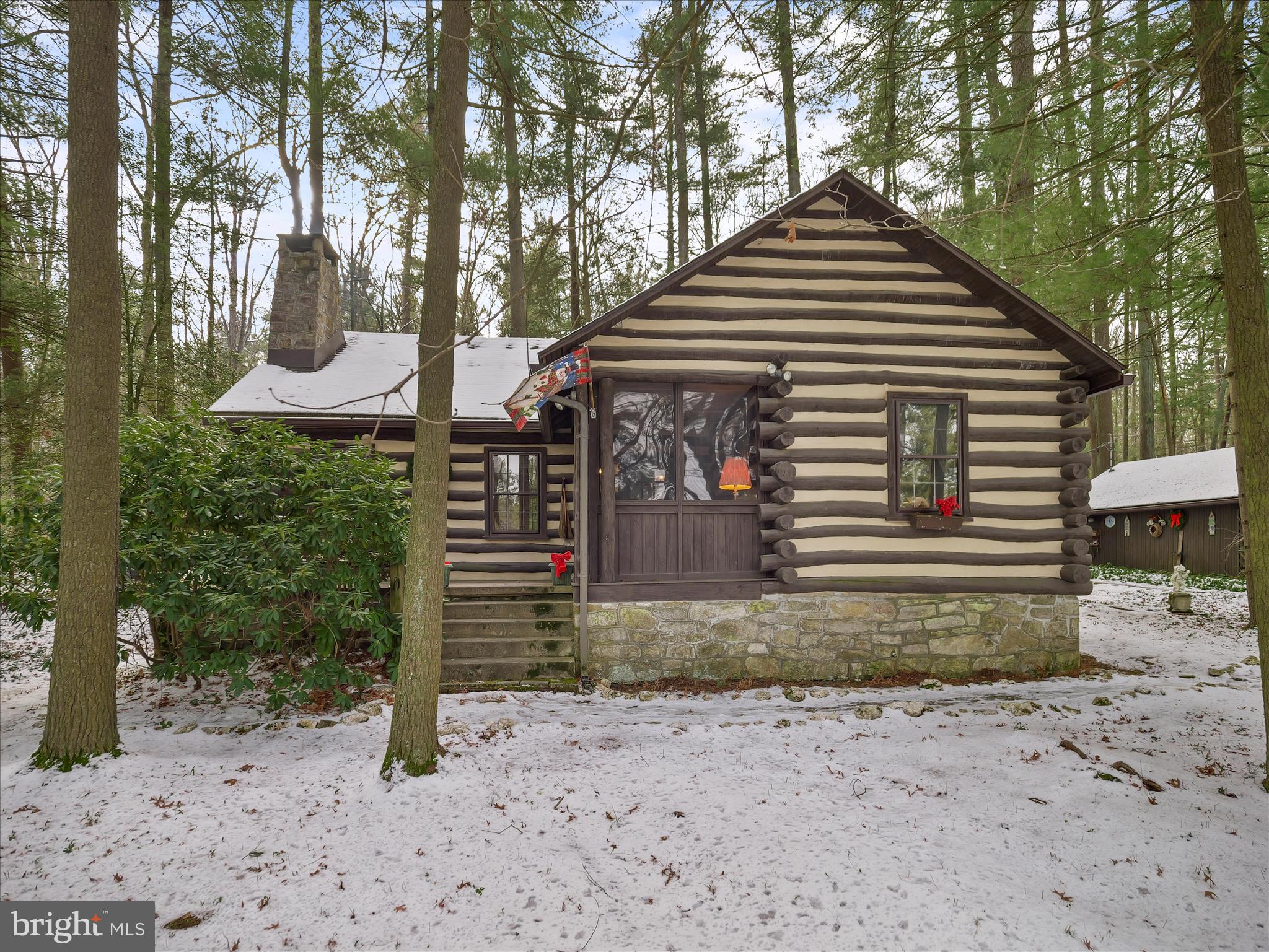 10086 Golf Course Road Fayetteville, PA 17222 - Photo 5 of 33 a front view of a house with garden