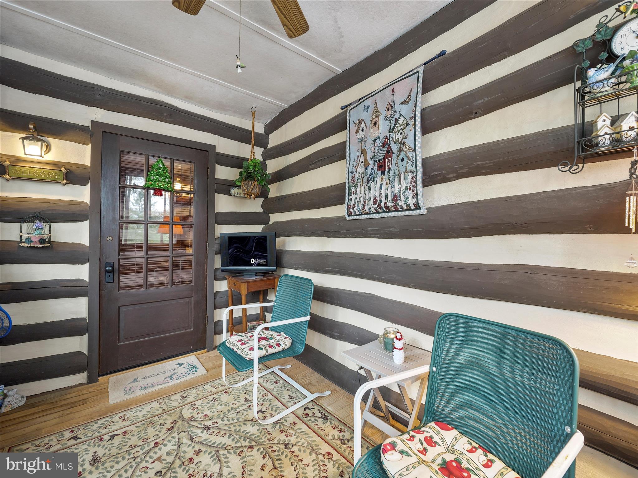 10086 Golf Course Road Fayetteville, PA 17222 - Photo 8 of 33 a living room with furniture and a rug
