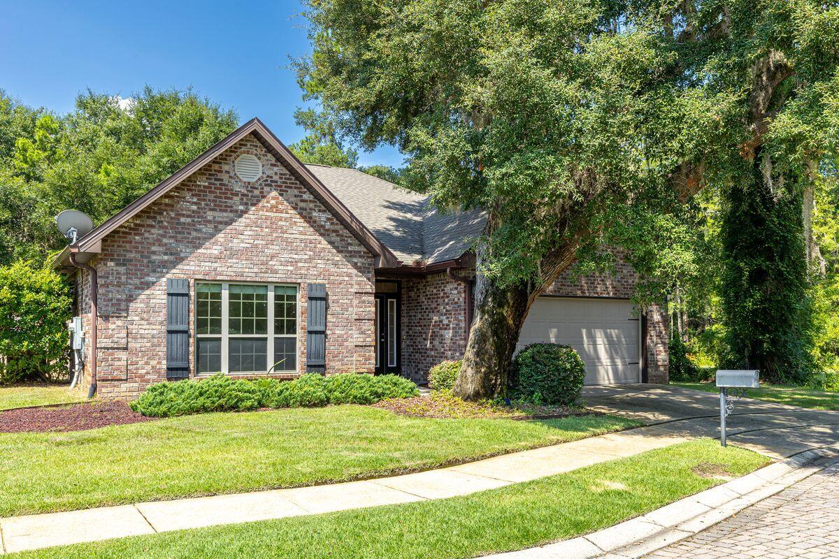 20 Big Oak Lane Santa Rosa Beach, FL 32459 - Photo 1 of 31 a front view of a house with a yard