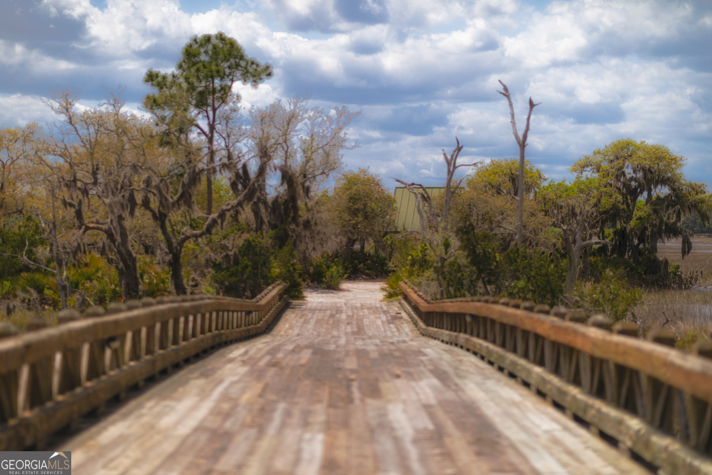 87 Lighthouse Way Woodbine, GA 31569 - Photo 111 of 116 a view of a balcony with wooden fence