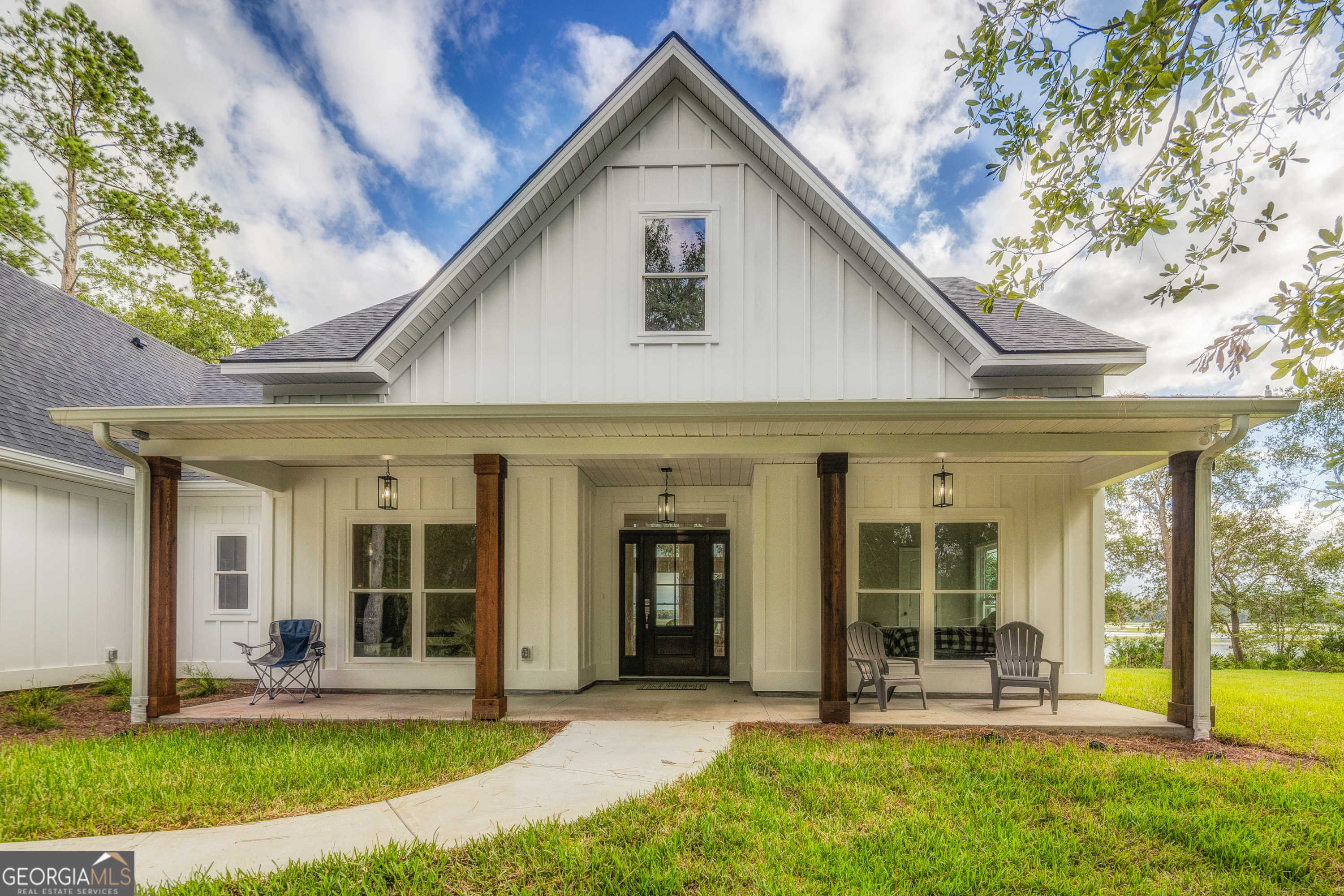87 Lighthouse Way Woodbine, GA 31569 - Photo 14 of 116 a view of a house with yard and front view of a house