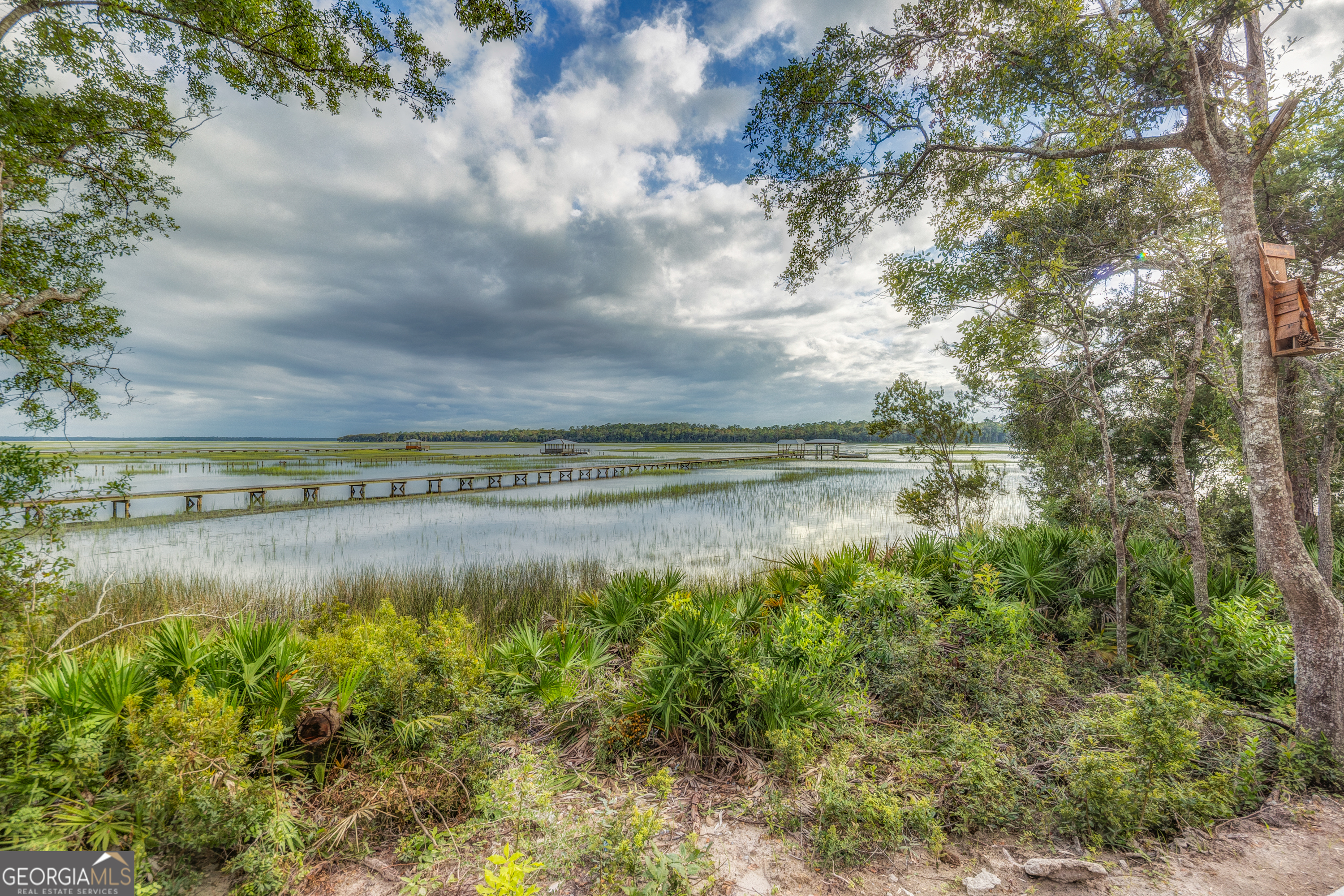87 Lighthouse Way Woodbine, GA 31569 - Photo 25 of 116 a view of a lake with outdoor space