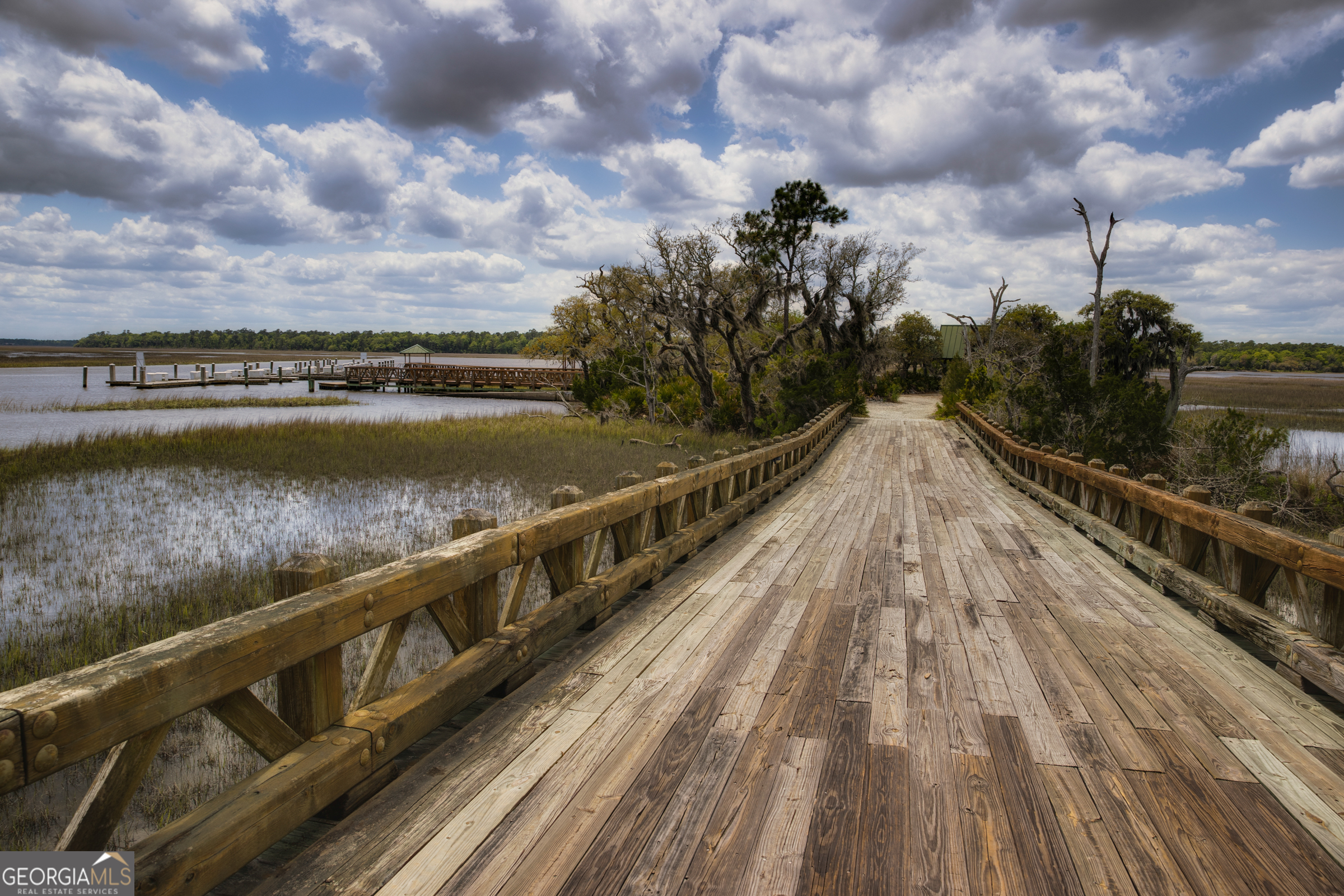 87 Lighthouse Way Woodbine, GA 31569 - Photo 38 of 116 a view of a balcony with wooden floor and city view