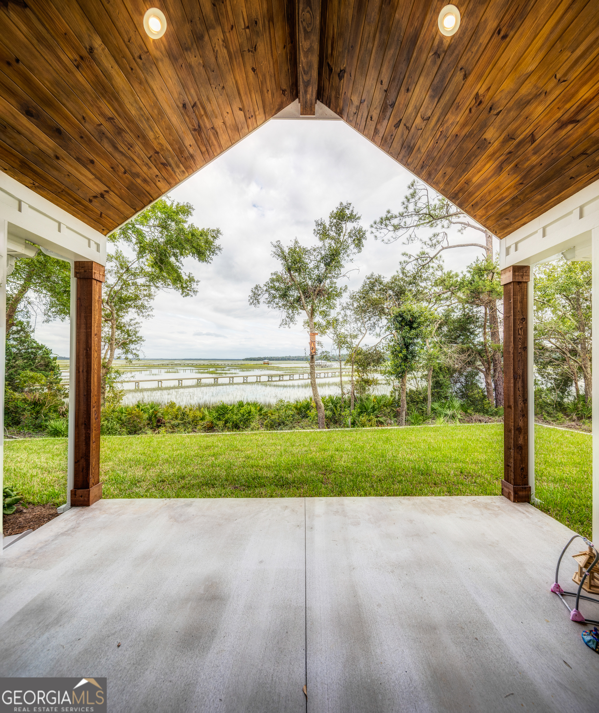 87 Lighthouse Way Woodbine, GA 31569 - Photo 7 of 116 a view of a backyard of the house