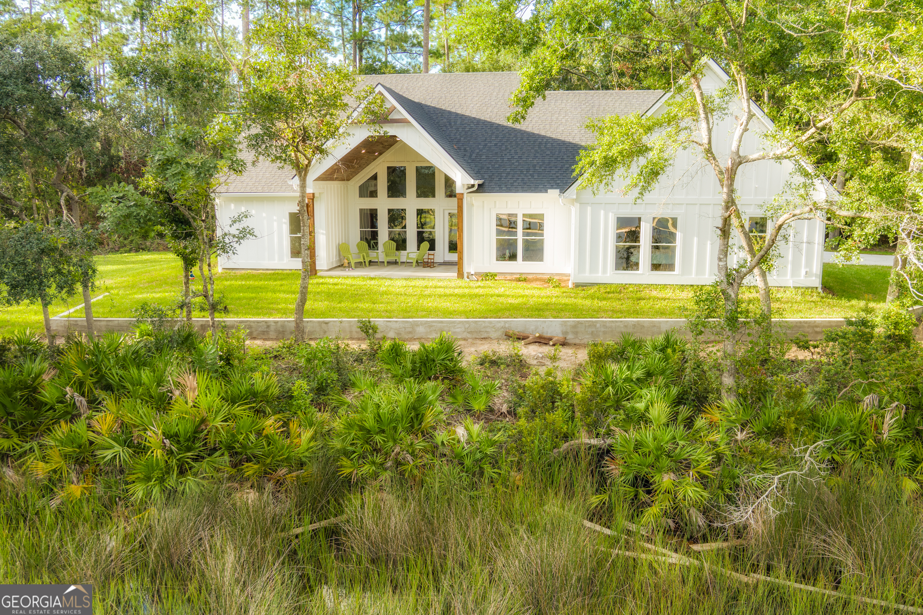 87 Lighthouse Way Woodbine, GA 31569 - Photo 10 of 116 a view of a house with a swimming pool