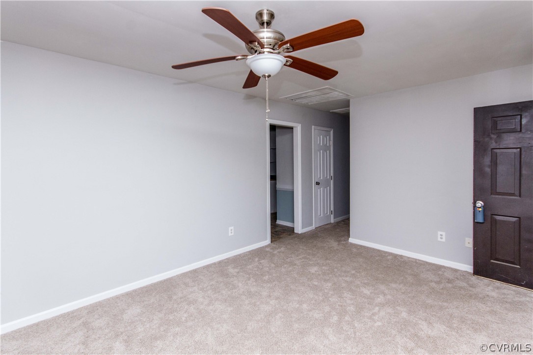 14912 Nash Road Chesterfield, VA 23838 - Photo 15 of 31 an empty room with closet and a ceiling fan
