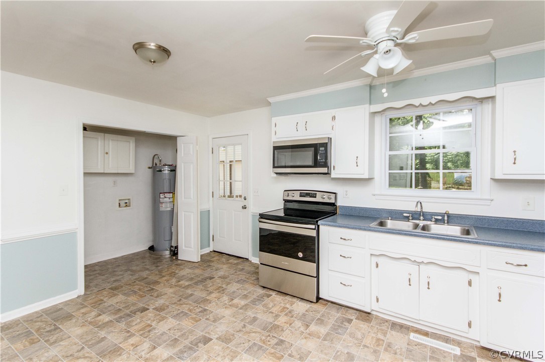14912 Nash Road Chesterfield, VA 23838 - Photo 18 of 31 a kitchen with stainless steel appliances granite countertop a stove a sink and a refrigerator