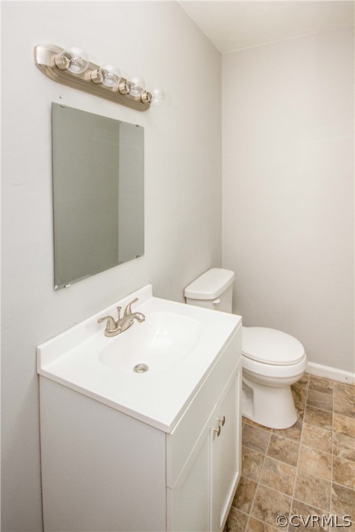 14912 Nash Road Chesterfield, VA 23838 - Photo 27 of 31 a bathroom with a toilet sink and mirror