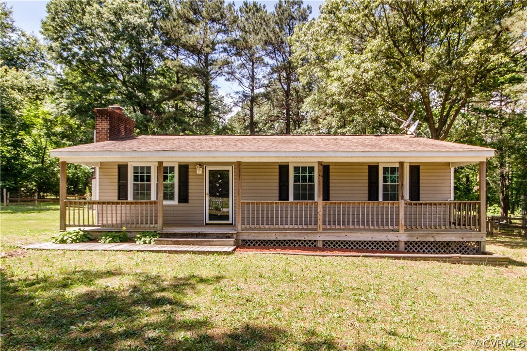 14912 Nash Road Chesterfield, VA 23838 - Photo 3 of 31 a front view of a house with a swimming pool
