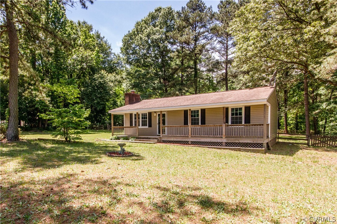 14912 Nash Road Chesterfield, VA 23838 - Photo 4 of 31 a front view of a house with a yard