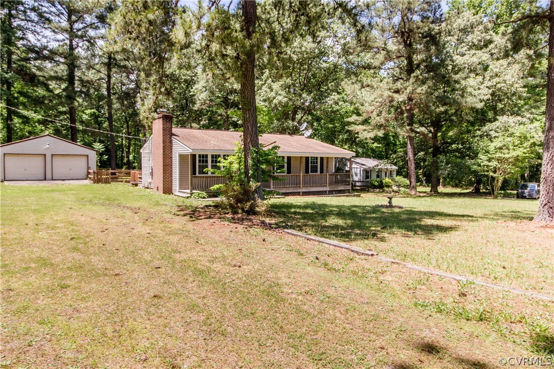 14912 Nash Road Chesterfield, VA 23838 - Photo 5 of 31 a house with yard in front of it