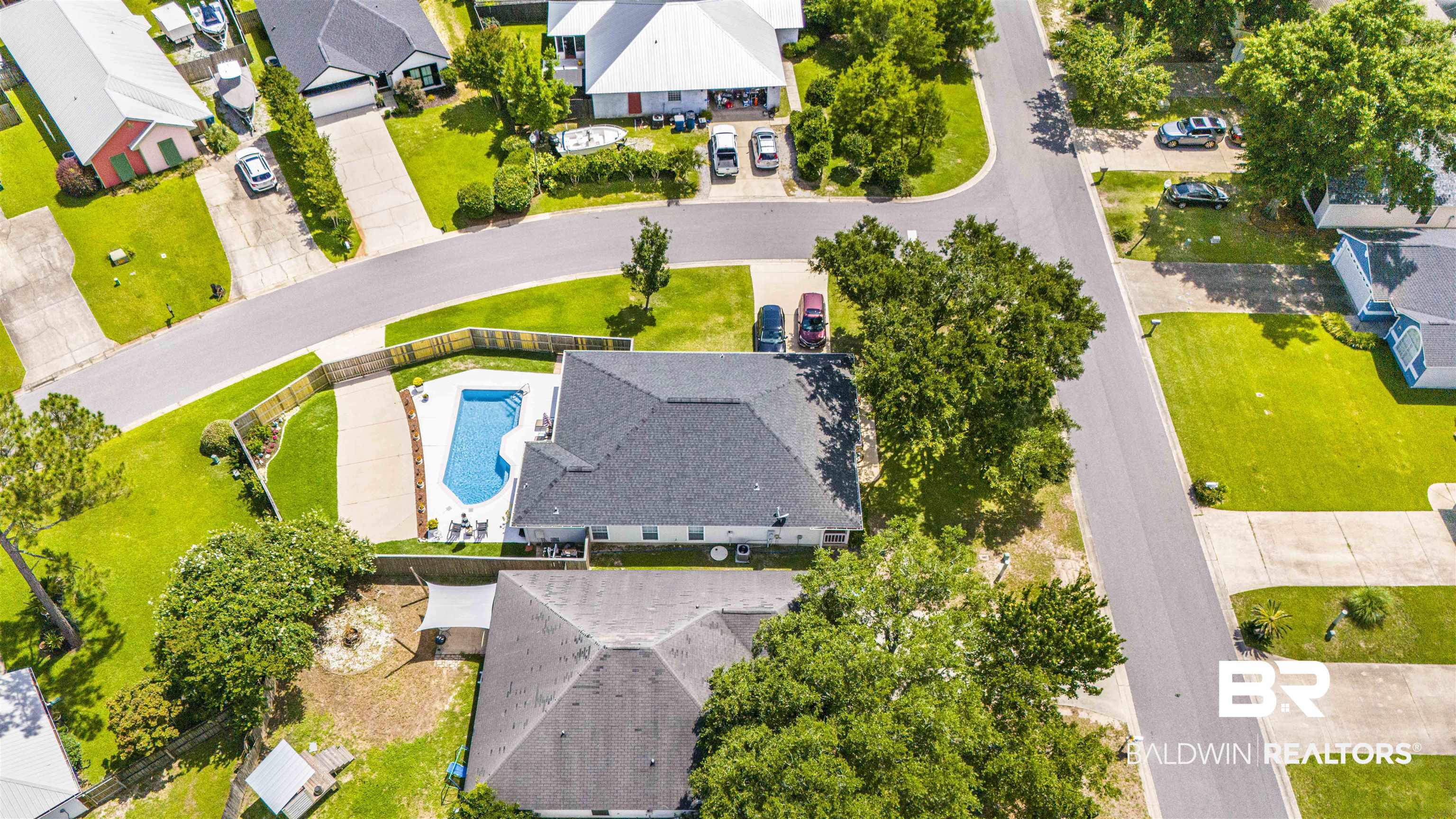 4620 Pine Boulevard Orange Beach, AL 36561 - Photo 42 of 49 Aerial perspective of suburban area featuring a pool area