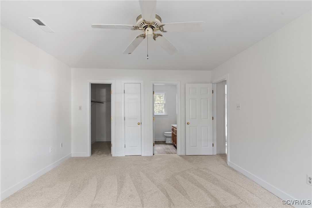 14310 Long Gate Road Midlothian, VA 23112 - Photo 13 of 31 a view of a livingroom with a chandelier fan