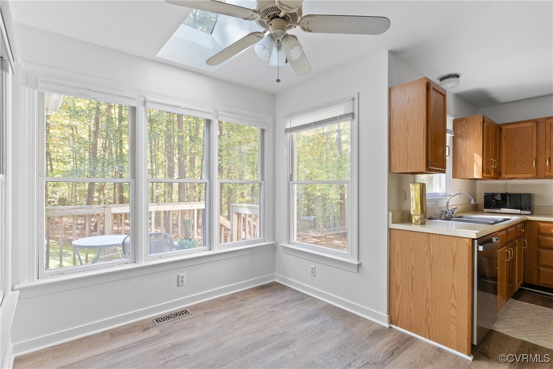 14310 Long Gate Road Midlothian, VA 23112 - Photo 6 of 31 a view of a kitchen with a sink and dishwasher a microwave oven