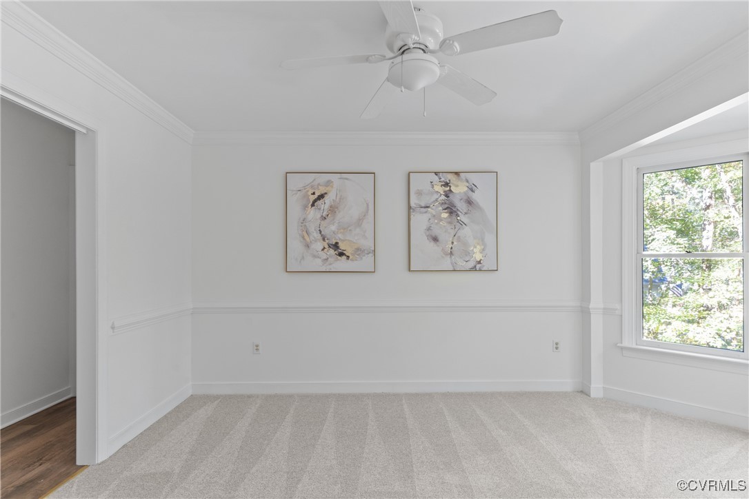 14310 Long Gate Road Midlothian, VA 23112 - Photo 10 of 31 an empty room with windows and fan