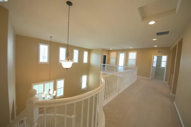 a view of empty room with windows