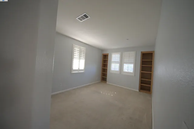 a view of a room with an empty space