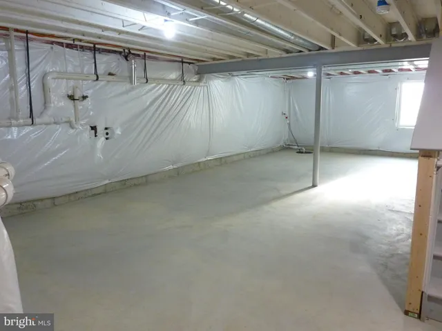 a view of a room with an empty space