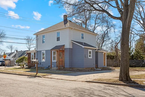 a front view of a house with garage