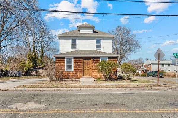 a front view of a building with street