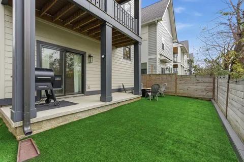 a view of yard with patio