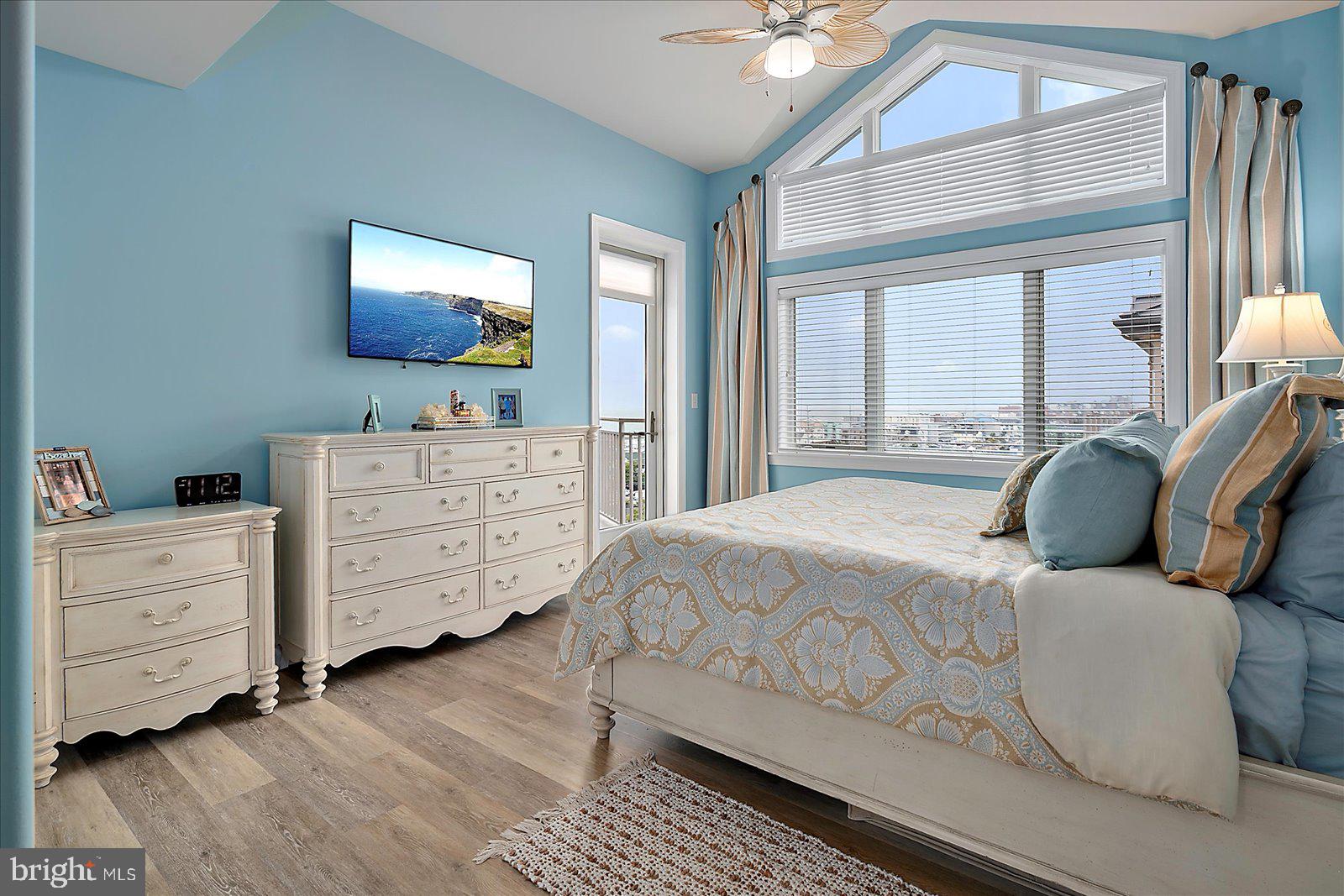 121 81st Street, Unit 907 Ocean City, MD 21842 - Photo 29 of 73 a bedroom with a bed and a dresser