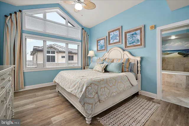 a bed room with a bed and a window