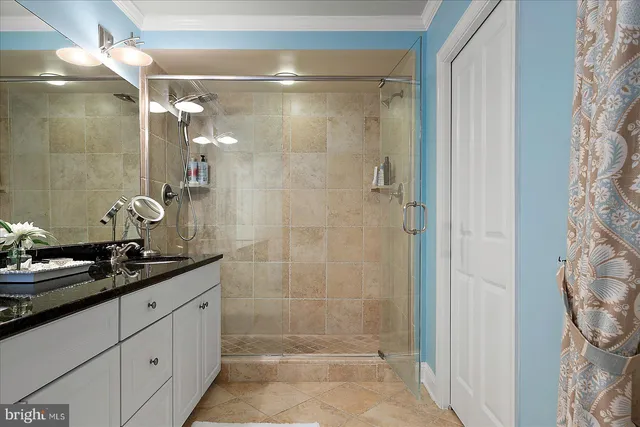 a bedroom with bed and window