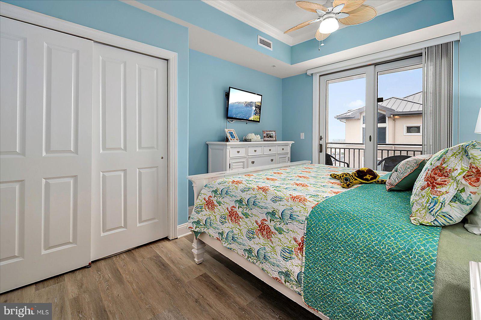 121 81st Street, Unit 907 Ocean City, MD 21842 - Photo 43 of 73 a bedroom with a bed and window