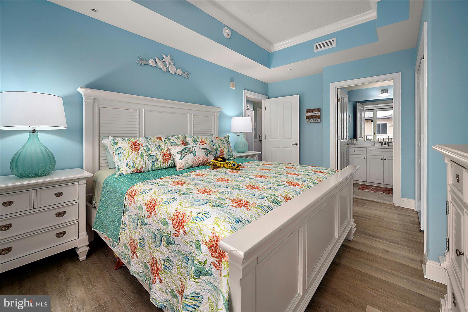 121 81st Street, Unit 907 Ocean City, MD 21842 - Photo 44 of 73 a bedroom with bed and window