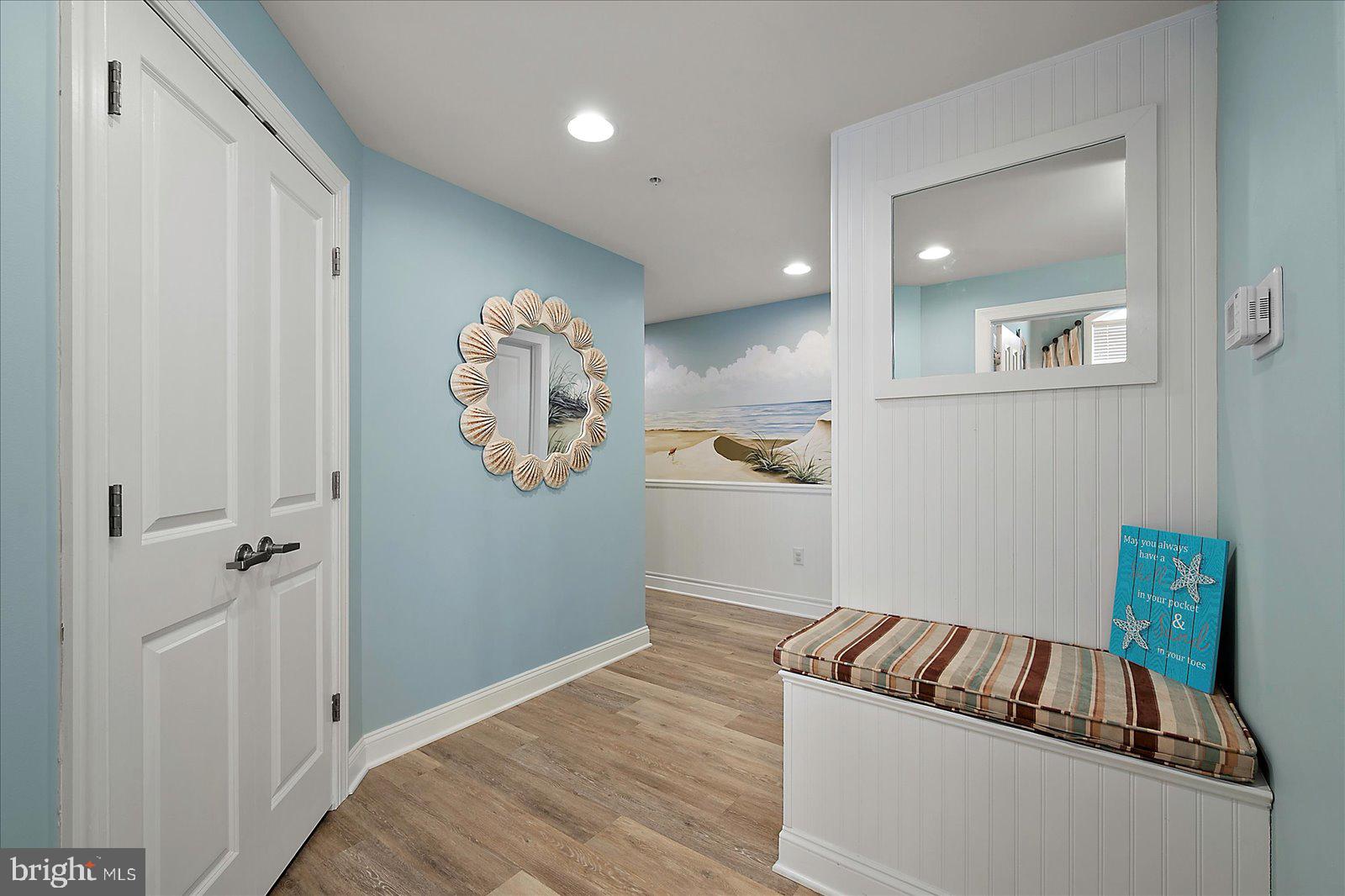 121 81st Street, Unit 907 Ocean City, MD 21842 - Photo 6 of 73 a room with cabinets and wooden floor