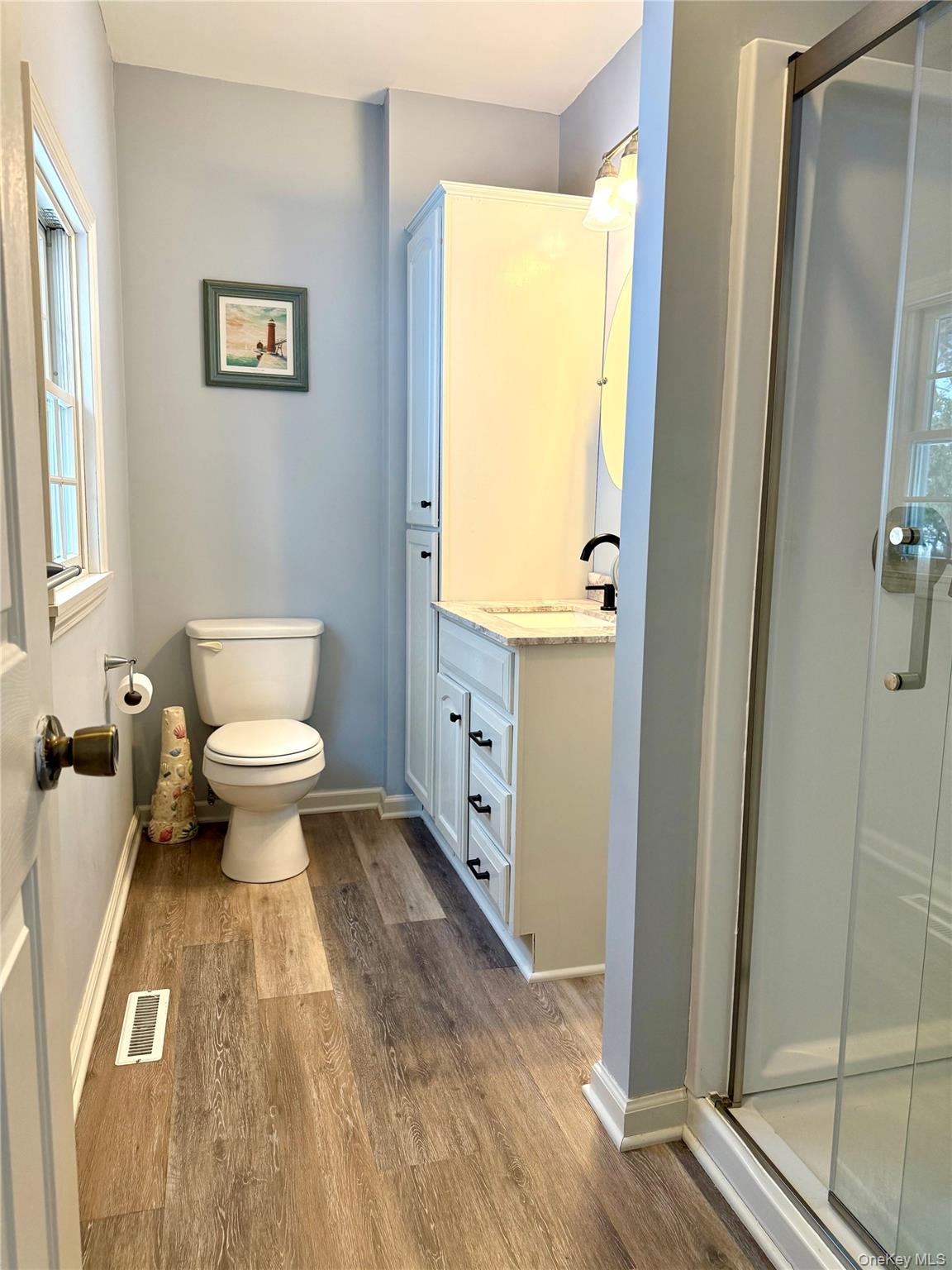 91-97 Sawmill Road Red Hook, NY 12571 - Photo 3 of 8 Full bath with plenty of natural light, a shower stall, and vanity