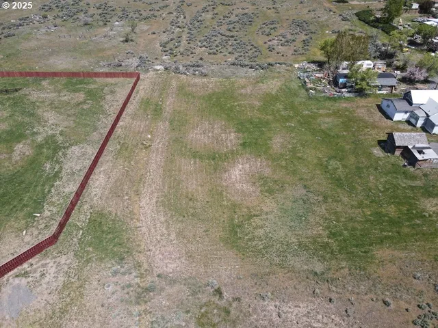 a view of a lake from a yard