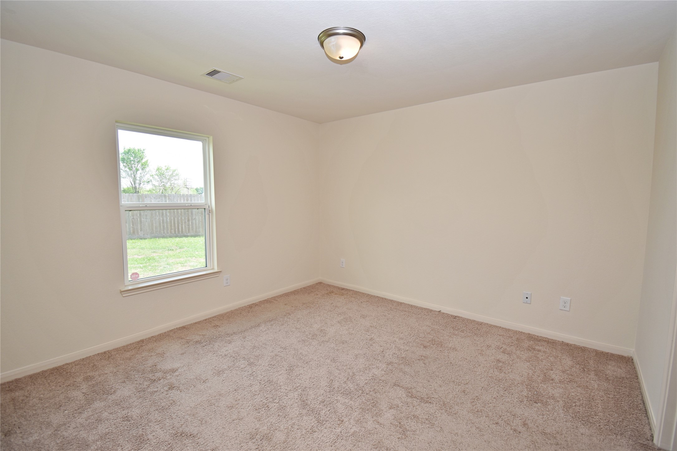106 Collins Court Kendleton, TX 77451 - Photo 11 of 13 an empty room with a window