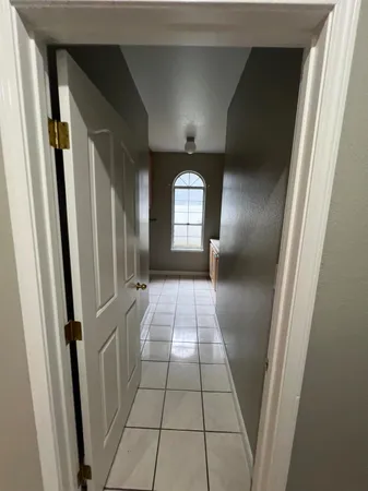 a bathroom with a shower and toilet